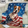 American Staffordshire dog blanket draped over a couch with blue stars and flag colors