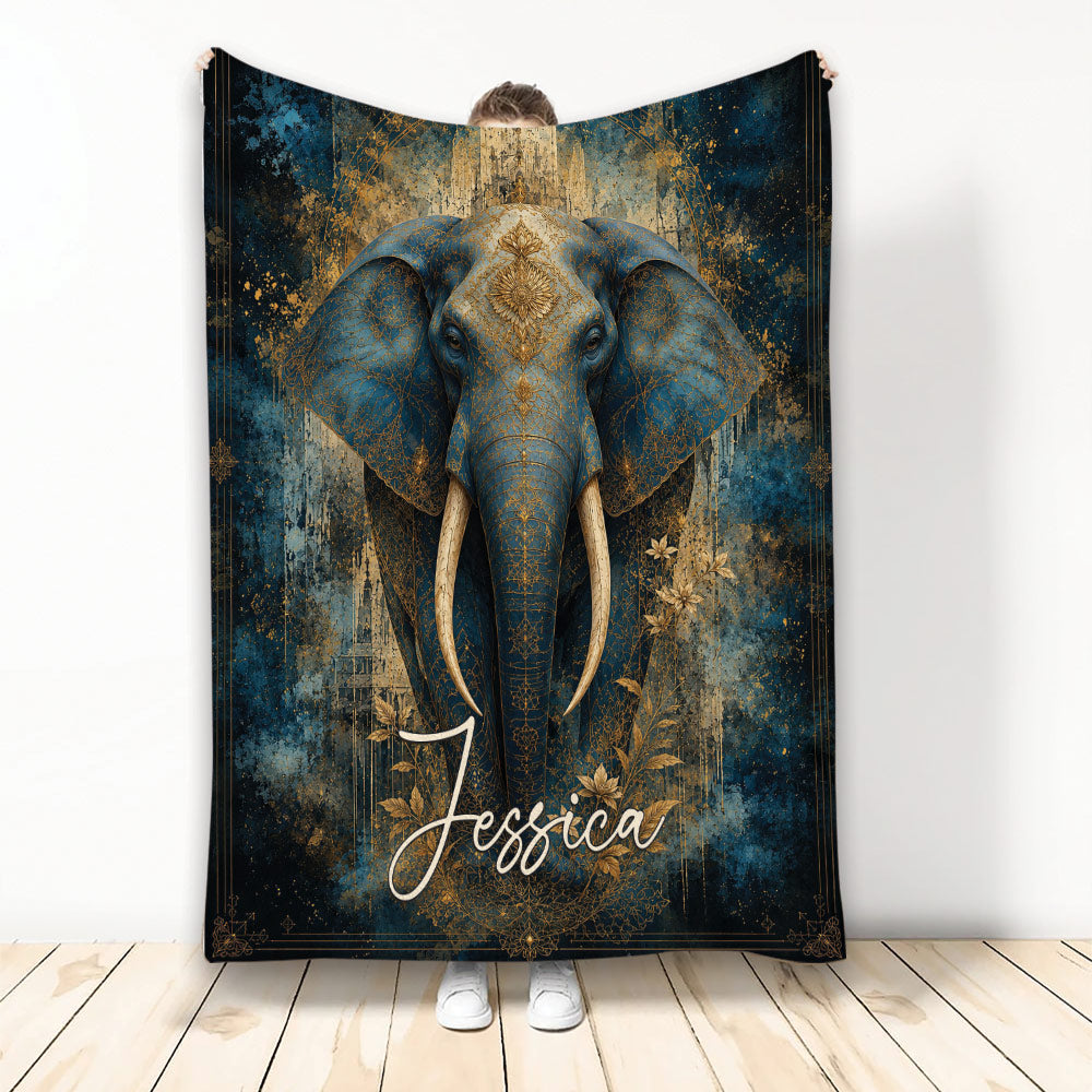 Ornate blue and gold elephant artwork displayed on a custom throw blanket