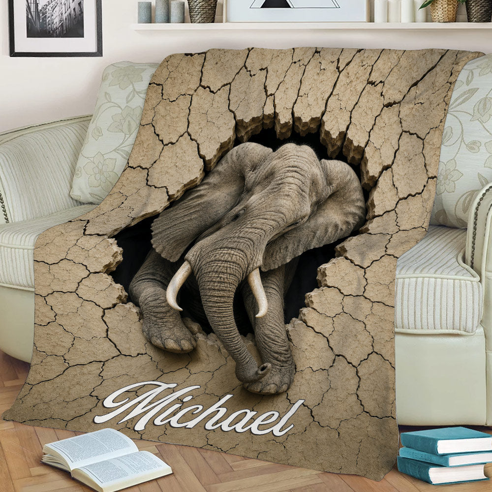 Elephant throw blanket draped across a sofa with realistic cracked earth wildlife artwork