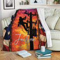 Patriotic lineman throw blanket draped over a sofa with utility worker artwork and vivid orange sunset colors