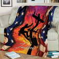 Lineman throw blanket displayed on a couch with electrical line worker silhouette and patriotic flag artwork