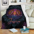 Yoga meditation mandala throw blanket draped over a cozy sofa