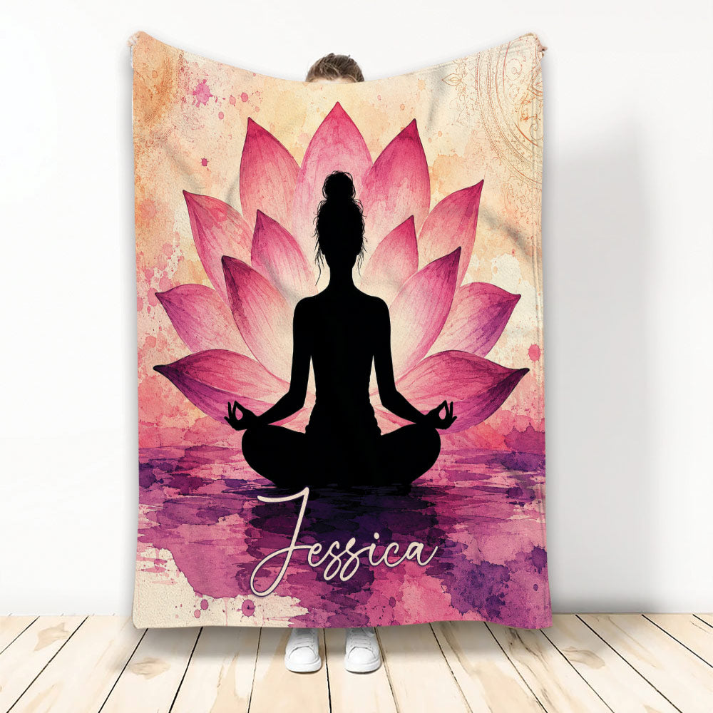 Yoga throw blanket featuring a seated meditation silhouette surrounded by pink lotus flowers and watercolor artwork