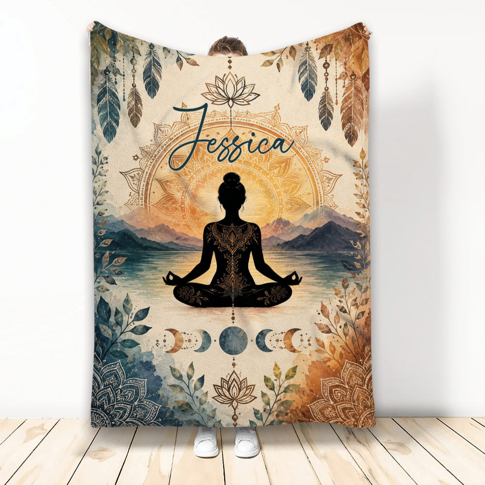 Yoga throw blanket with meditating figure, lotus mandala, mountain lake, feathers, and moon phase artwork