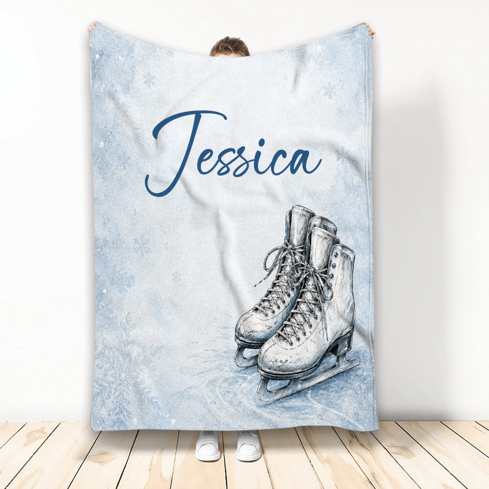Custom ice skating throw blanket with illustrated white skates on a snowy blue winter background