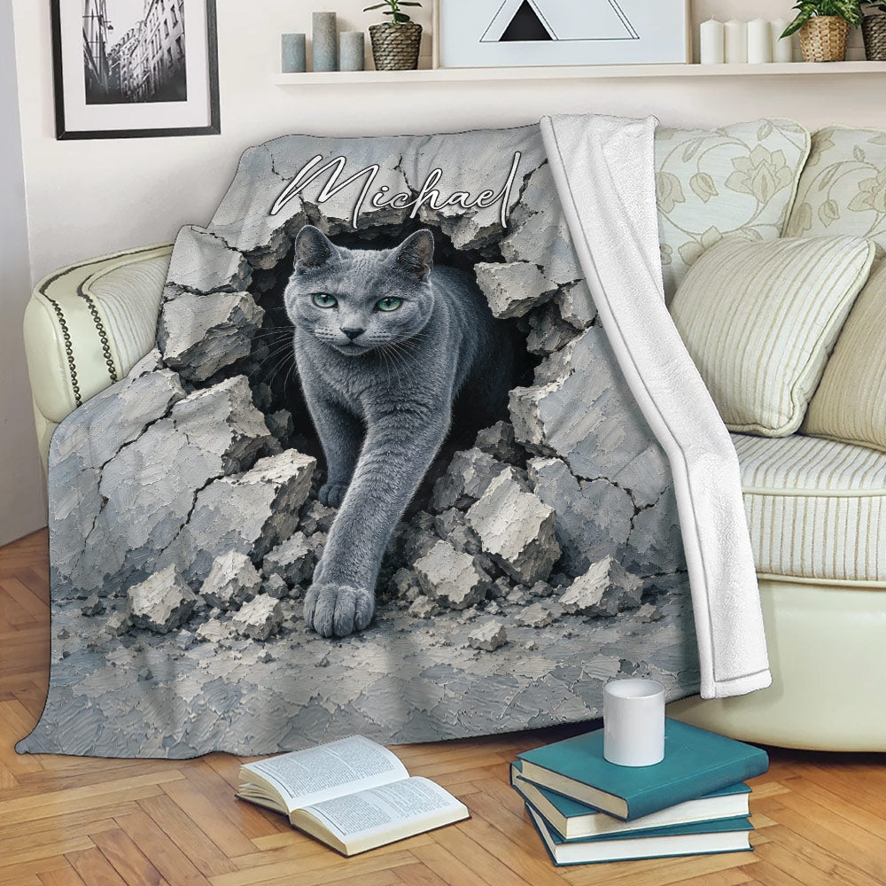 Russian Blue cat blanket draped over a sofa with dramatic cracked wall artwork in cool gray tones