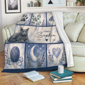Russian Blue cat throw blanket displayed on a sofa with watercolor artwork and soft blue botanical details