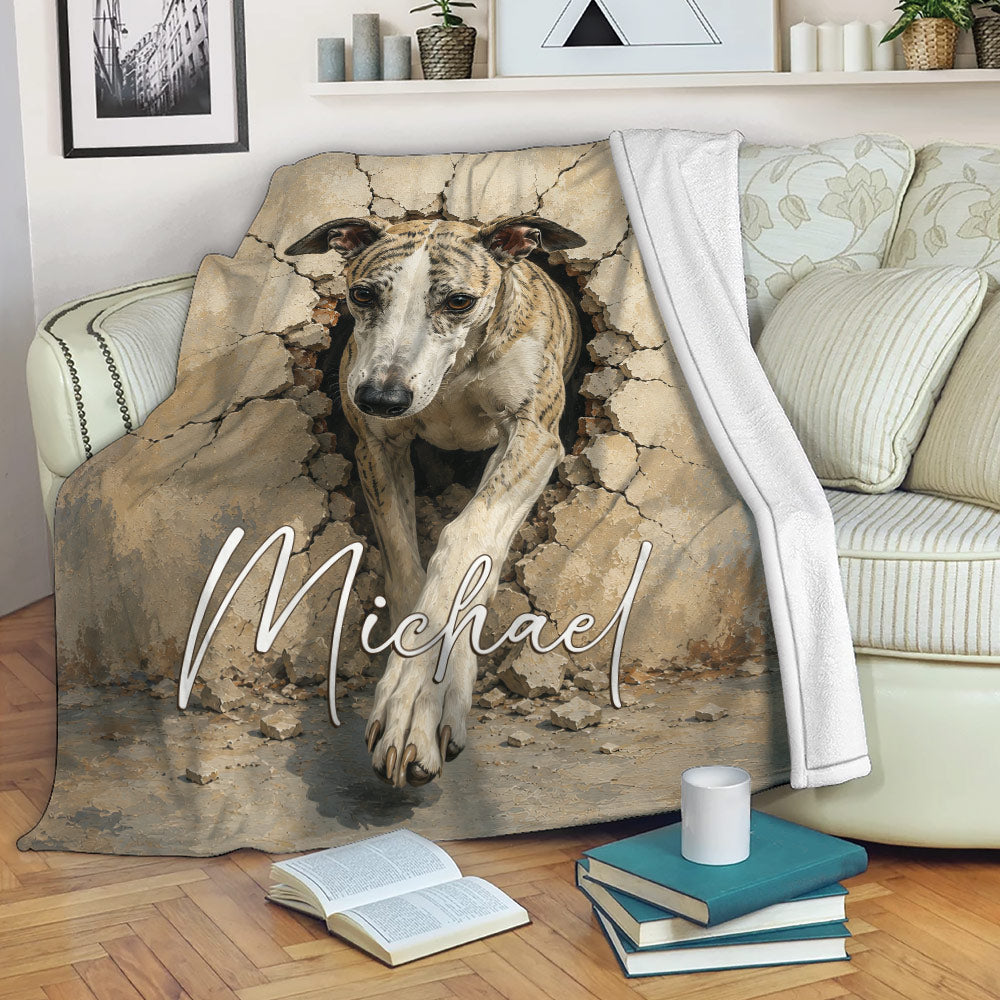 Whippet blanket displayed on a sofa with dramatic cracked wall dog artwork