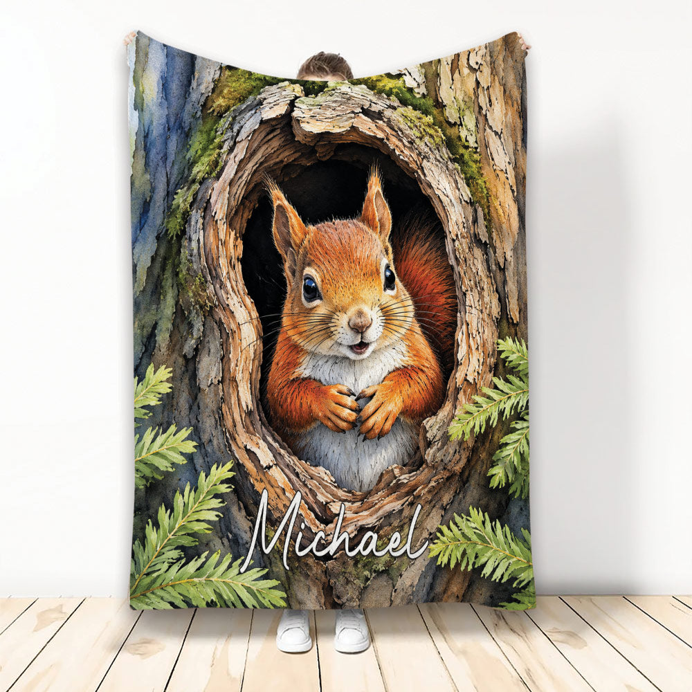 Squirrel throw blanket featuring a bright woodland squirrel emerging from a mossy tree hollow