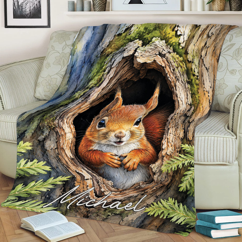 Woodland squirrel throw blanket draped over a sofa with a detailed tree hollow artwork