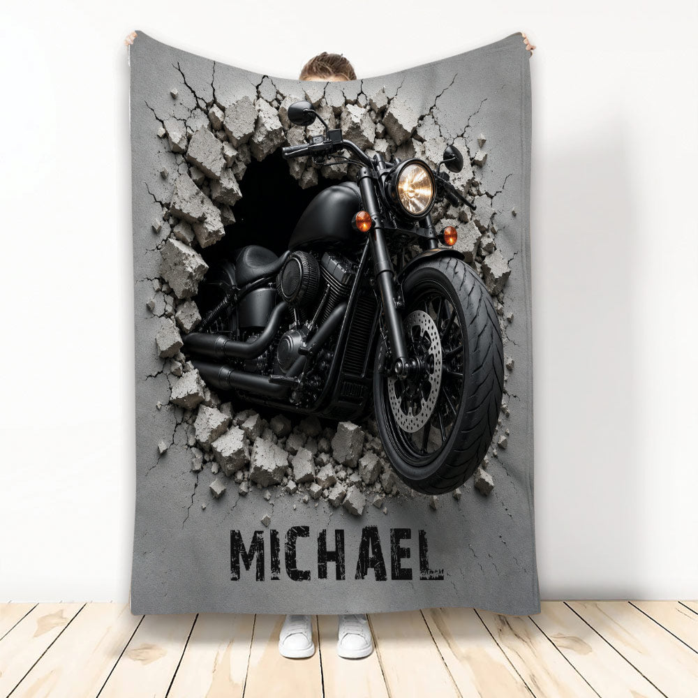 Biker throw blanket featuring a black motorcycle breaking through a cracked concrete wall