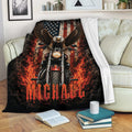 Motorcycle biker blanket draped over a couch with eagle, American flag, smoke and fiery red artwork
