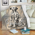 Dalmatian throw blanket draped over a sofa with cozy reading nook decor