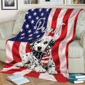 Dalmatian dog throw blanket displayed on a couch with stars and stripes design