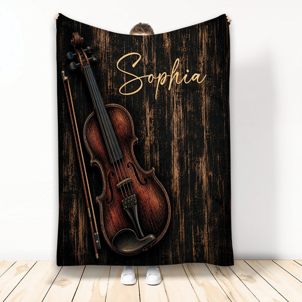 Violin throw blanket displayed vertically with rich woodgrain artwork and a warm black and copper palette