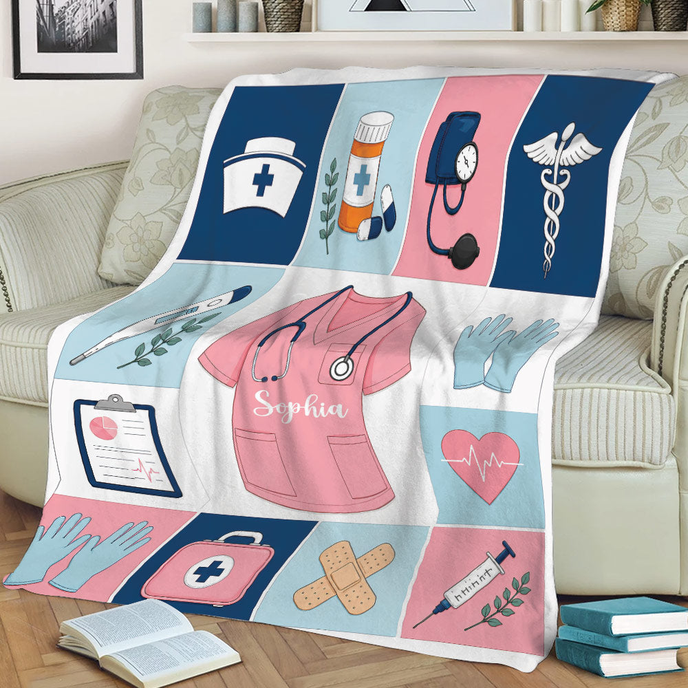 Nurse throw blanket shown on a sofa with stethoscope, scrubs, medical kit, gloves, heart, and medical symbols