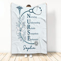 Nurse throw blanket featuring a stethoscope, medical emblem, floral artwork, and uplifting nursing theme