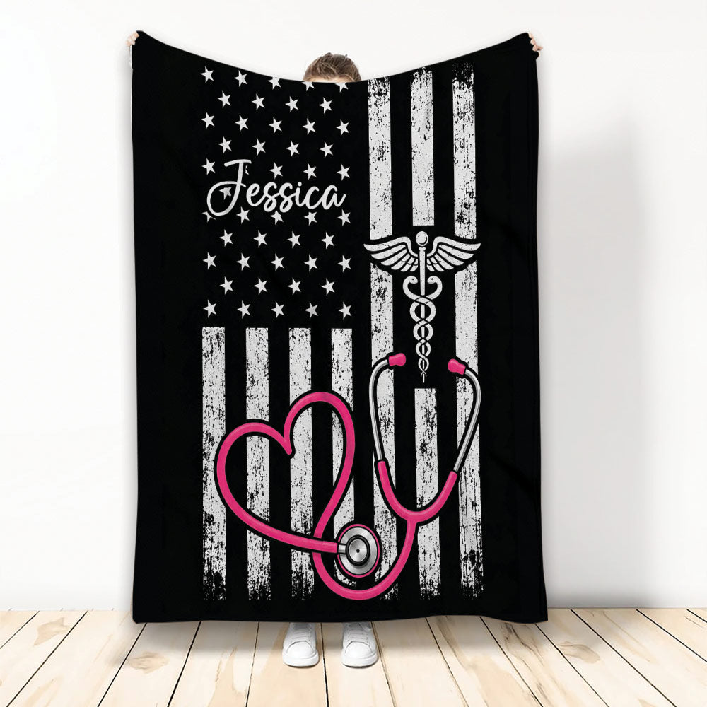 Nurse throw blanket featuring a stethoscope, medical symbol, stars, and distressed black and white flag artwork