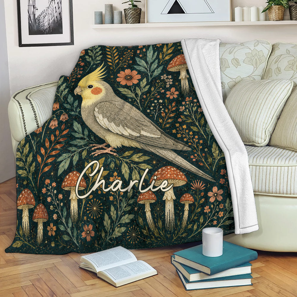 Cockatiel blanket draped over a sofa, showing botanical bird artwork in a cozy living room