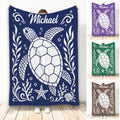 Navy turtle throw blanket with sea turtle artwork, coral, shells, starfish, and decorative ocean motifs