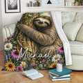 Sloth blanket draped over a sofa with forest tree and vibrant floral artwork