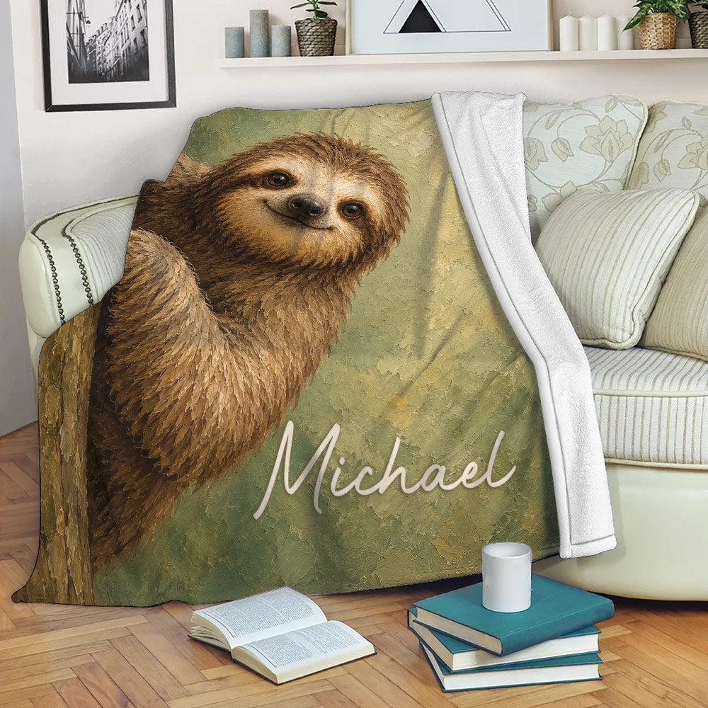 Sloth blanket draped over a sofa with playful woodland artwork in a cozy living room setting