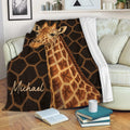Giraffe throw blanket draped over a sofa with bold wildlife artwork and brown geometric pattern