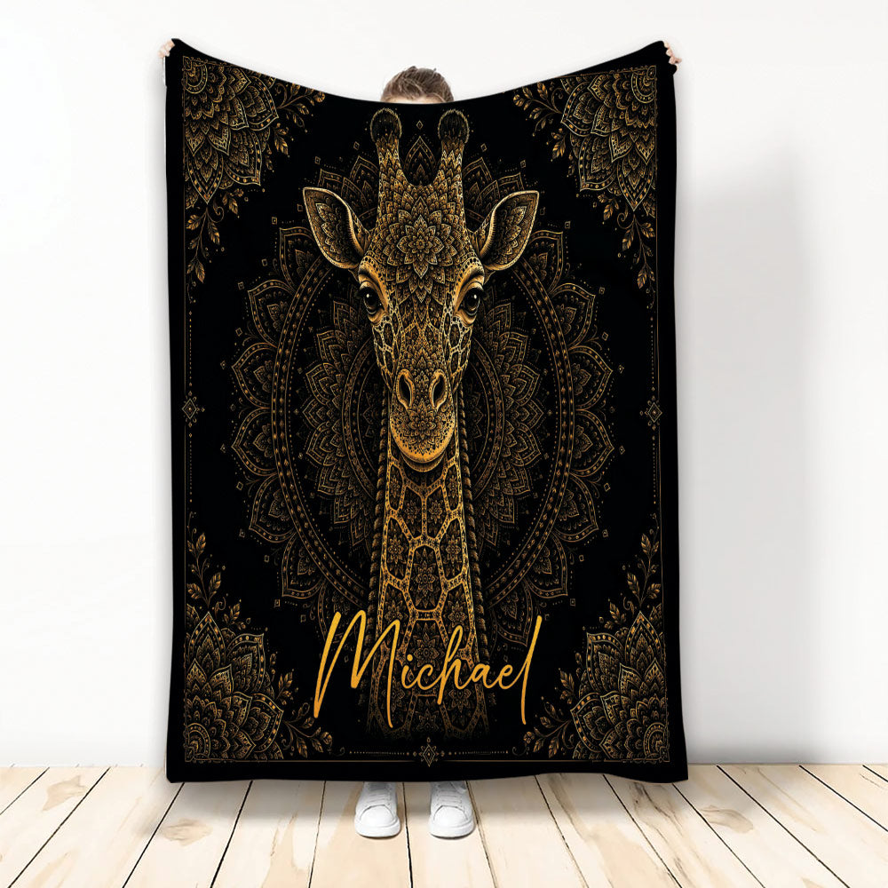 Black and gold giraffe throw blanket with ornate mandala artwork displayed against a light background