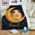 Guinea pig throw blanket draped over a sofa with celestial moon, stars and cozy pet-themed artwork