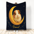 Guinea pig blanket featuring a cute guinea pig sitting on a golden crescent moon under a starry night sky