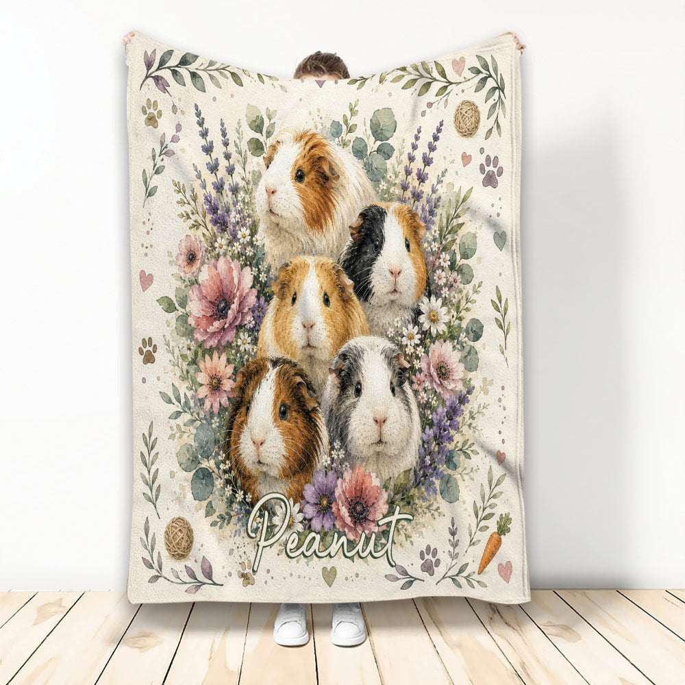 Guinea pig throw blanket featuring five guinea pigs surrounded by colorful flowers, leaves, hearts, and carrots