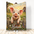 Custom pig blanket featuring a cheerful piglet on a rustic fence in a flower-filled farm meadow