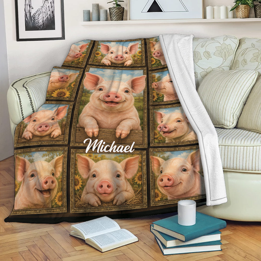 Pig throw blanket draped over a sofa with smiling pig portraits and sunflower farm scenery