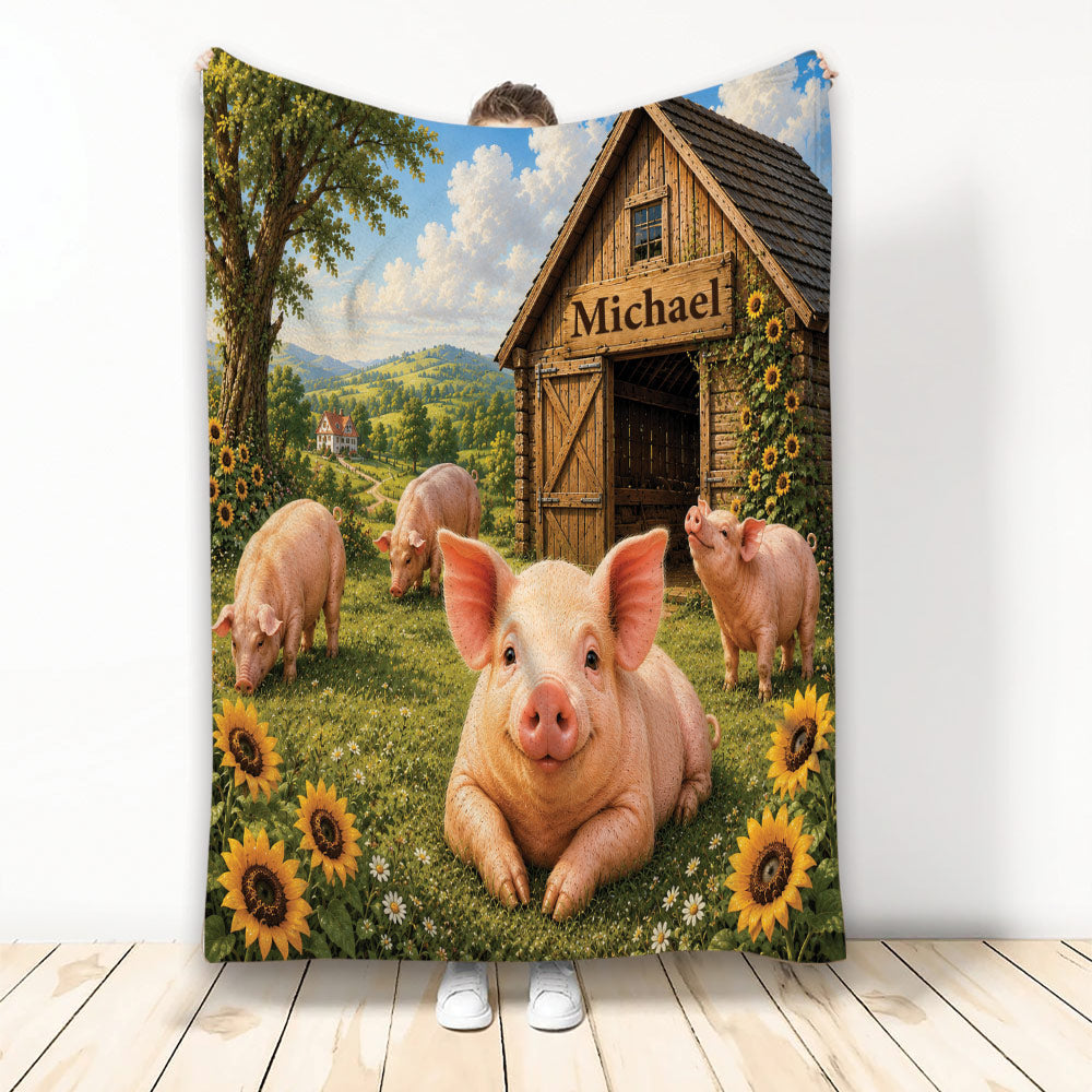 Pig blanket featuring a happy pig in a sunflower meadow beside a rustic barn and rolling countryside