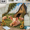 Farm pig blanket displayed on a sofa with a large pig, rustic barn, green hills, and sunflower artwork