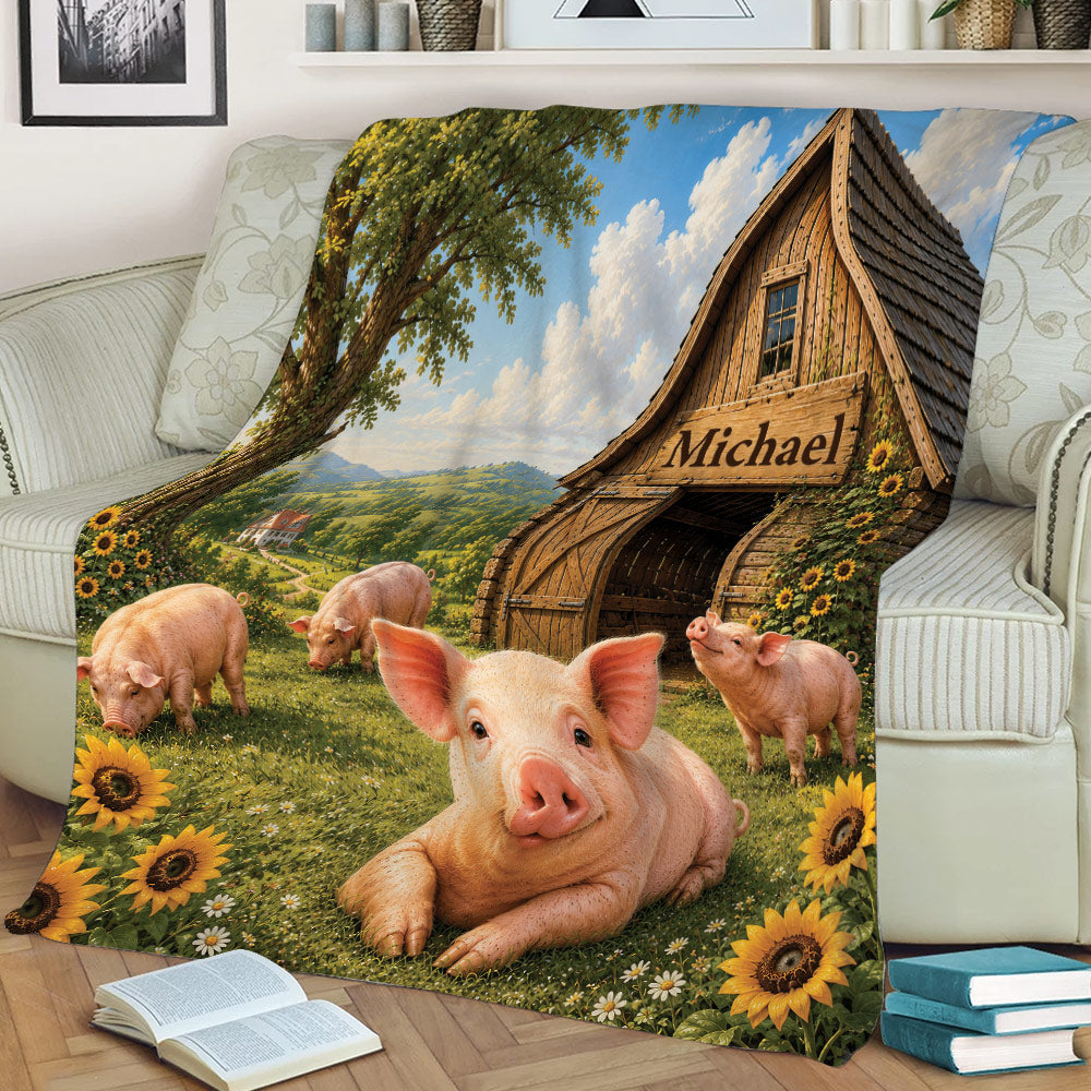 Farm pig blanket displayed on a sofa with a large pig, rustic barn, green hills, and sunflower artwork