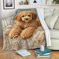 Labradoodle throw blanket displayed on a cozy sofa with books and home decor