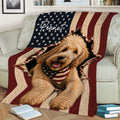 Patriotic Labradoodle throw blanket draped over a sofa, featuring a curly dog and American flag design