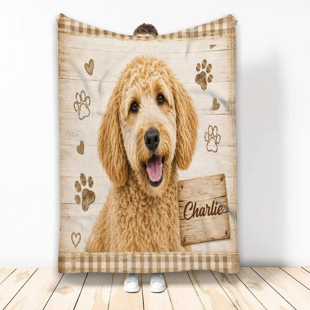 Labradoodle throw blanket with a curly golden dog, rustic wood background, paw prints, hearts, and plaid border