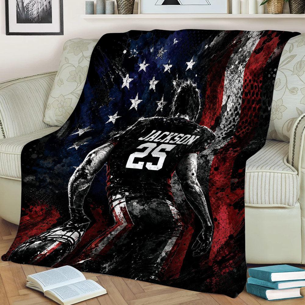 American football player and patriotic flag artwork draped across a living room sofa