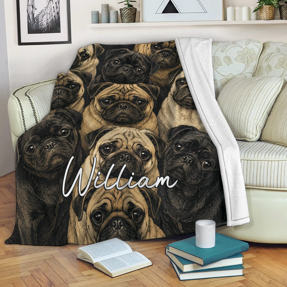 Pug throw blanket displayed on a sofa with repeating illustrated pug artwork