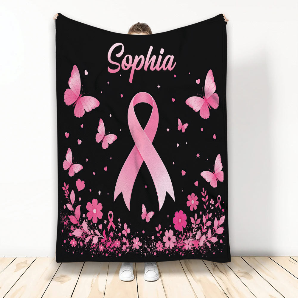 Breast cancer awareness blanket with a large pink ribbon, butterflies, flowers, and hearts on black