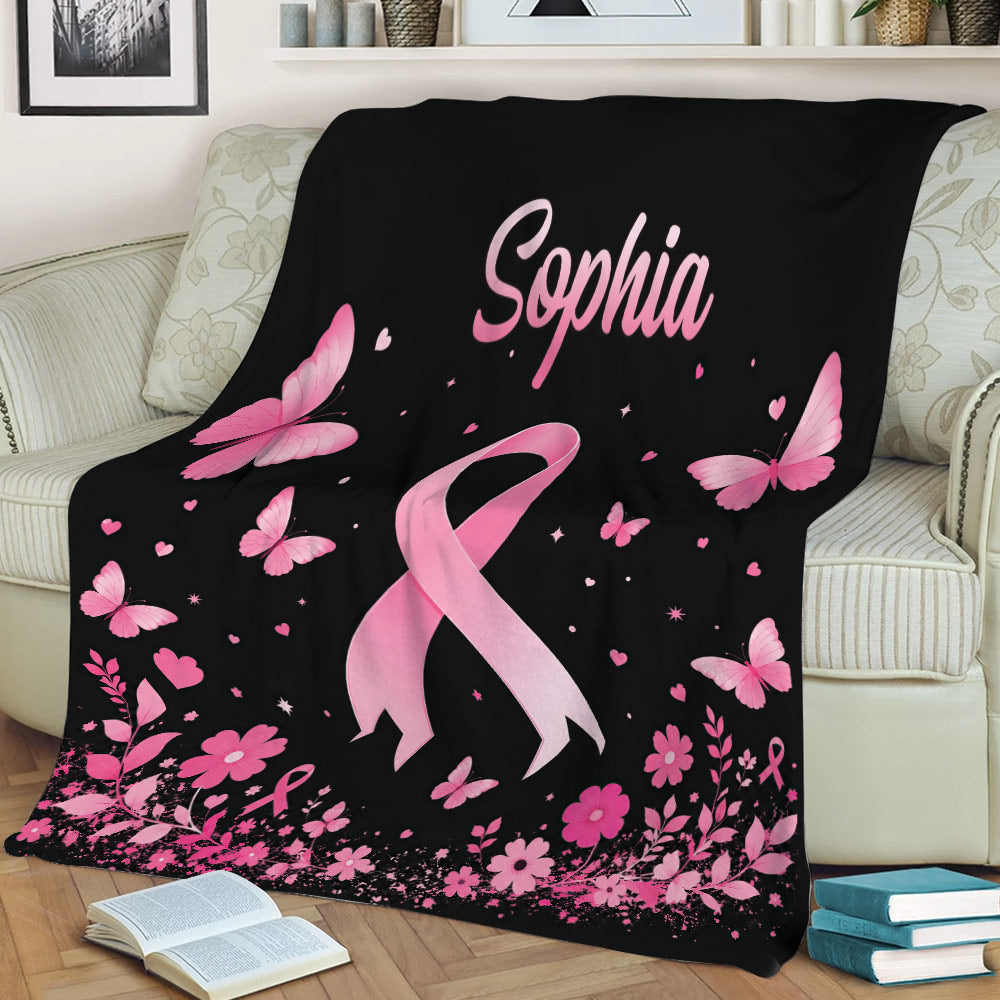 Breast cancer support blanket with pink ribbon, butterfly, heart, and floral artwork
