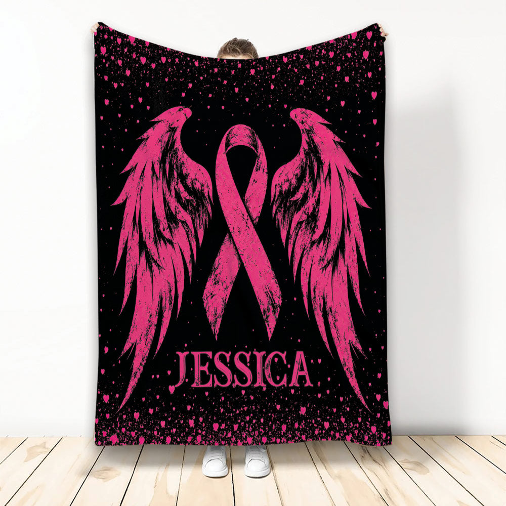 Breast cancer awareness throw blanket with pink ribbon wings and heart pattern on a black background