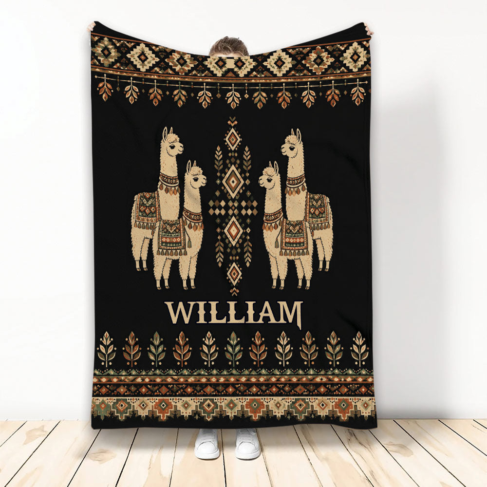 Black alpaca throw blanket with Southwestern geometric borders and decorative alpaca artwork