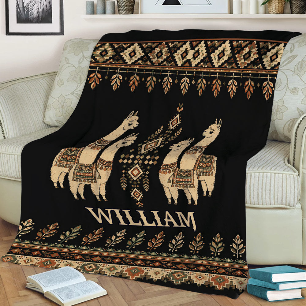 Boho alpaca blanket draped across a sofa with geometric motifs and warm Southwestern colors