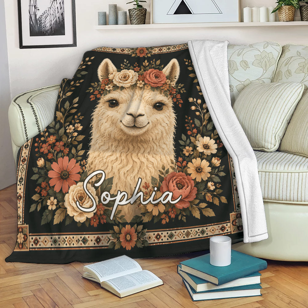 Alpaca throw blanket draped over a sofa with floral artwork and cozy reading nook decor