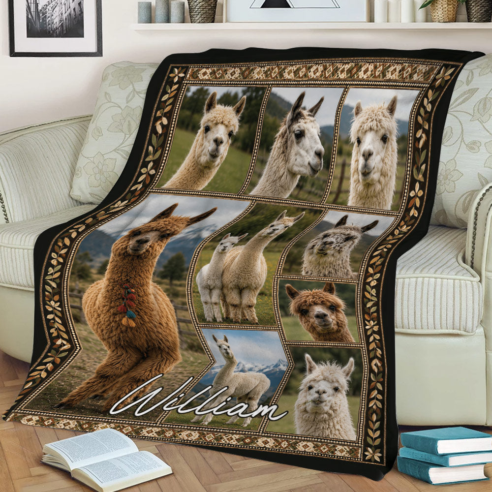 Alpaca blanket styled across a sofa with nature scenes, alpaca portraits, and a decorative border