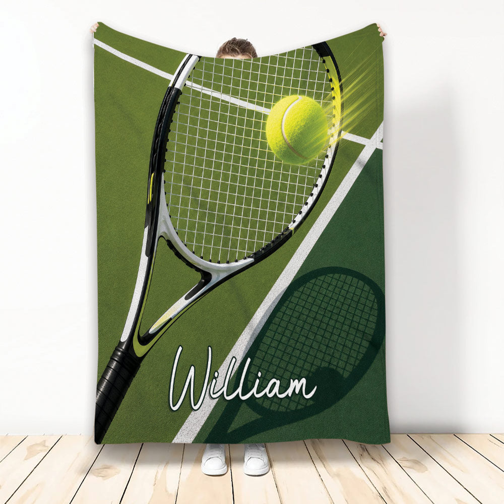 Tennis throw blanket with racket, bright tennis ball, green court design, and dramatic racket shadow