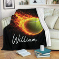 Fiery tennis ball throw blanket displayed across a couch in a cozy living room